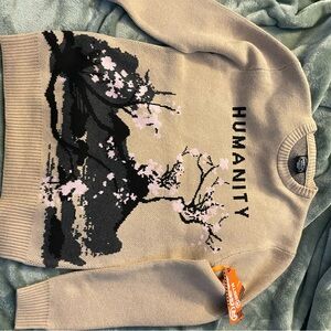 Beige Sweater with Artistic Design
